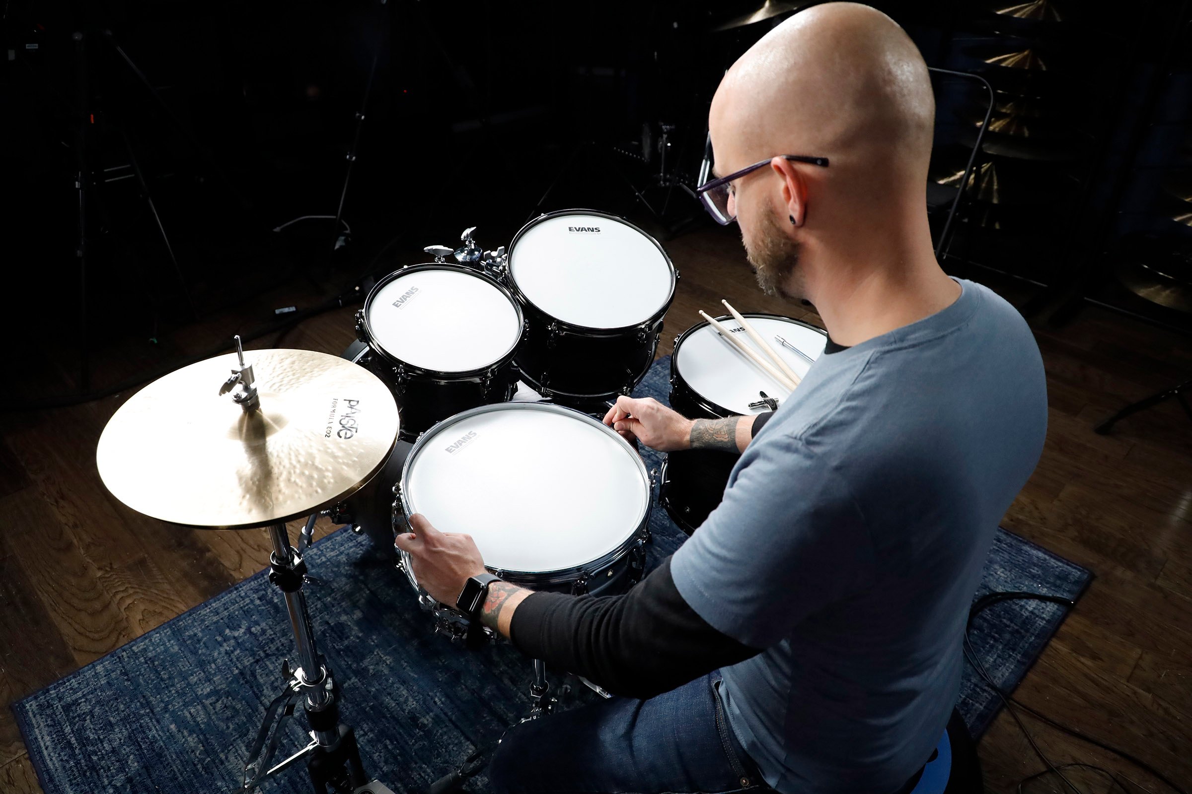 Changing drum outlet heads