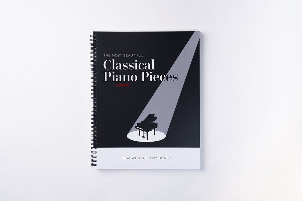 Black and white book on white background. Title of book is "The Most Beautiful Classical Piano Pieces" by Lisa Witt and Eleny Quapp.