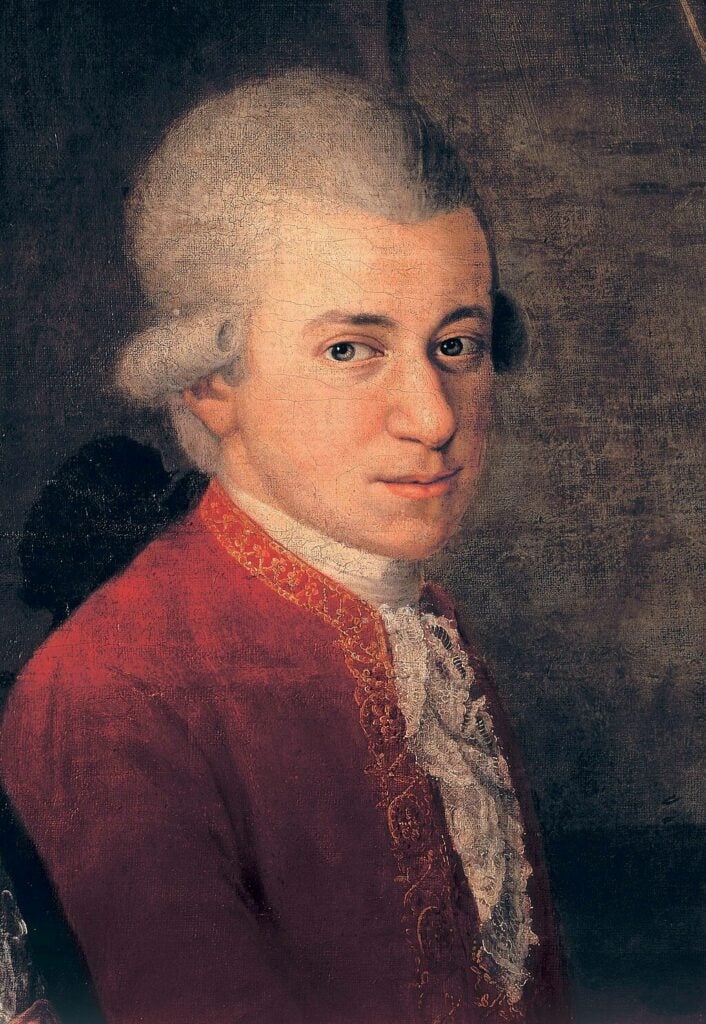 Painting of classical era man in red suit and white wig.
