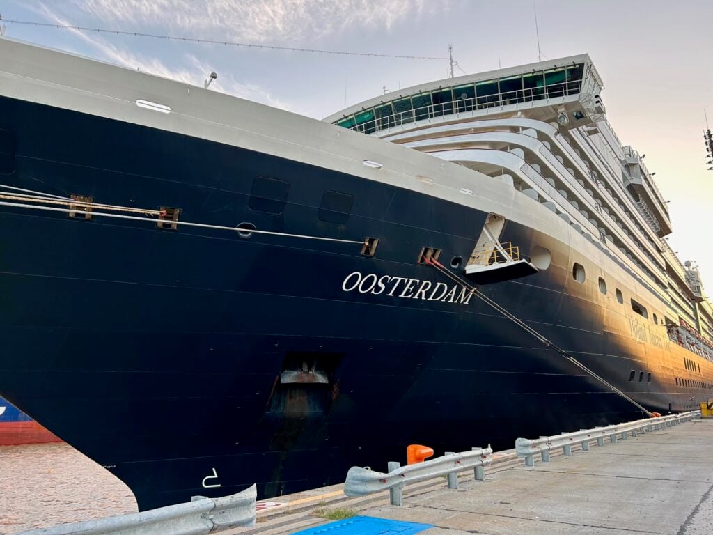 Up close view of a cruise ship with "Oosterdam" on the bow.