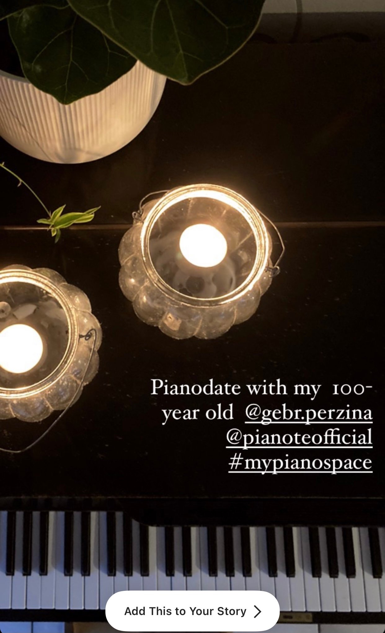 Piano with crystal lanterns in dim lighting.